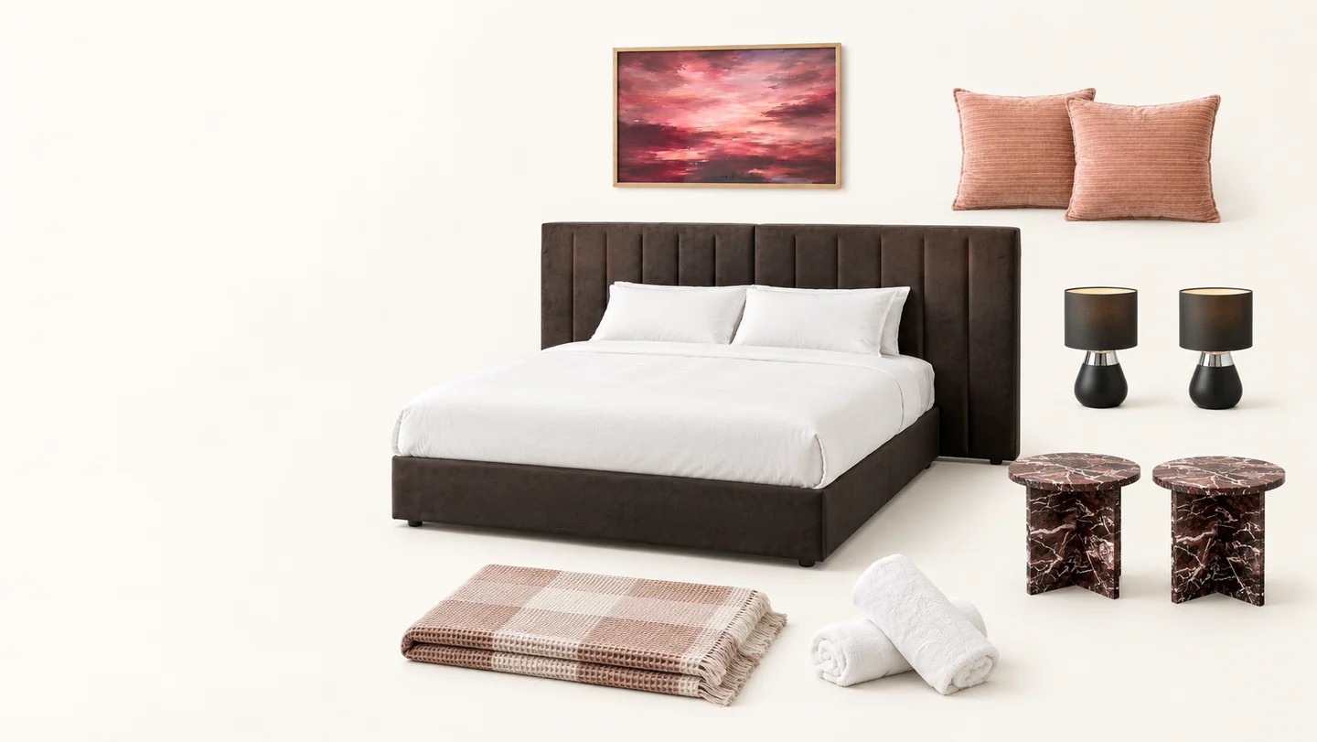 Illustrative bedroom selection with a double bed, peach cushions, bedside lamps and textiles